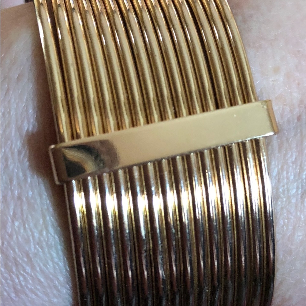 Gold tone bangle bracelet